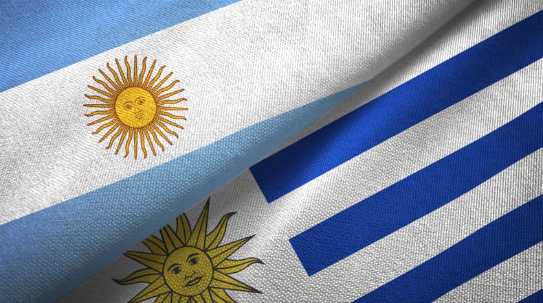 Uruguay and Argentina two flags together textile cloth, fabric texture