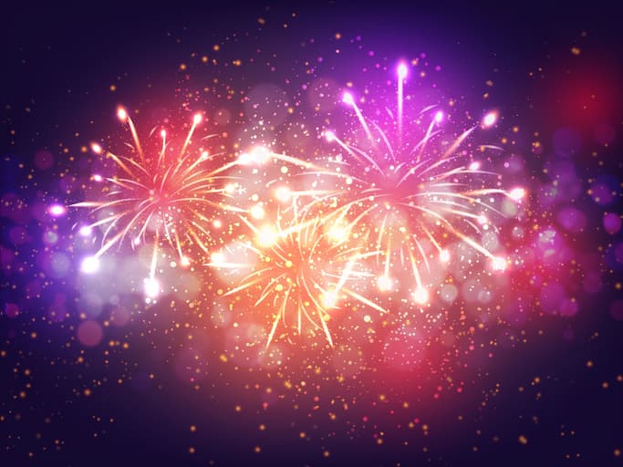 Colorful Fireworks Lighting Effect on Purple Background for Celebration Concept, happy