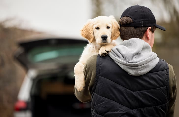 Man with puppy
