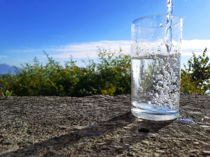 water filling up a glass