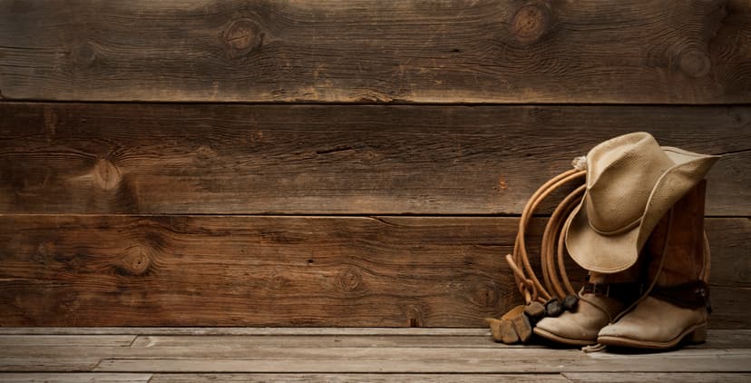 Western barnwood background w/boots, hat, lasso-extra wide, cowboy, wild
