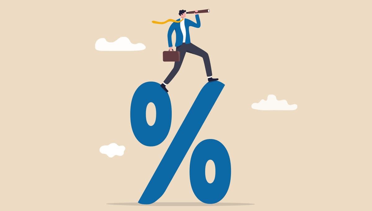 Man astride a giant percentage sign looking to the future with a telescope