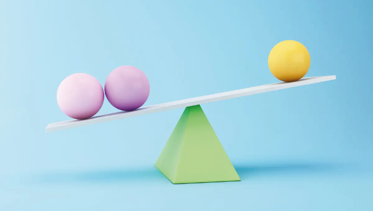 Graphic of two purple spheres and one yellow sphere balancing on top of a green triangle