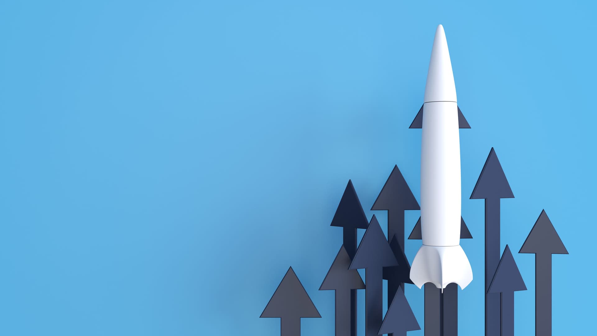 A rocket lifting off against a blue background, with black arrows pointing upwards behind it