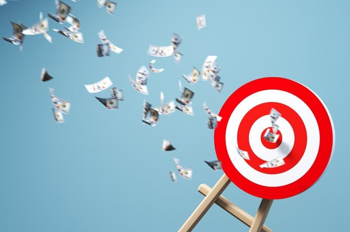 target board with money flowing out