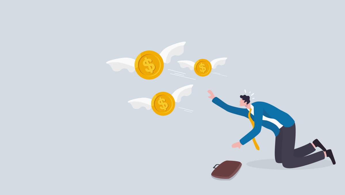 Gold coins with white wings fly away from a man