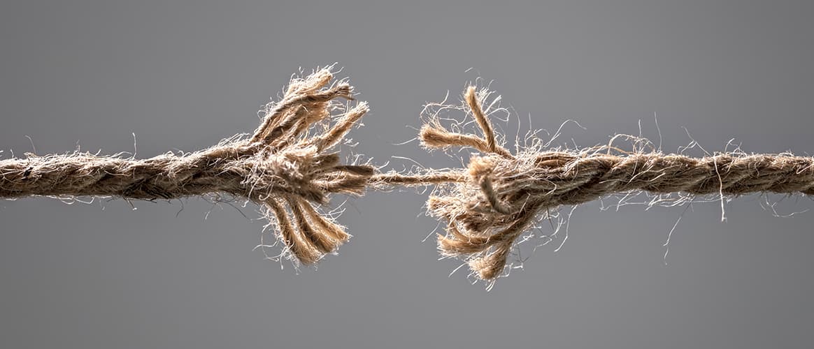 A frayed rope close to snapping