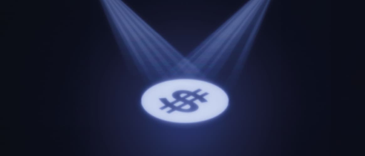 Dollar sign under spotlight