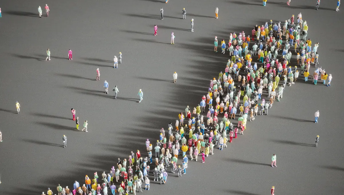 Group of people forming an arrow